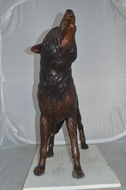 Howling Wolf Bronze Statue -  Size: 40"L x 10"W x 32"H.