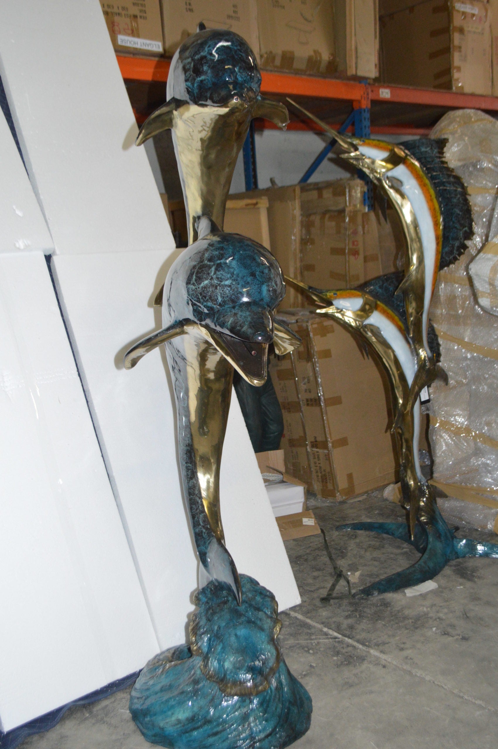 Two Dolphins Overreach Others on Waves Bronze Statue -  44"L x 23"W x 76"H. 