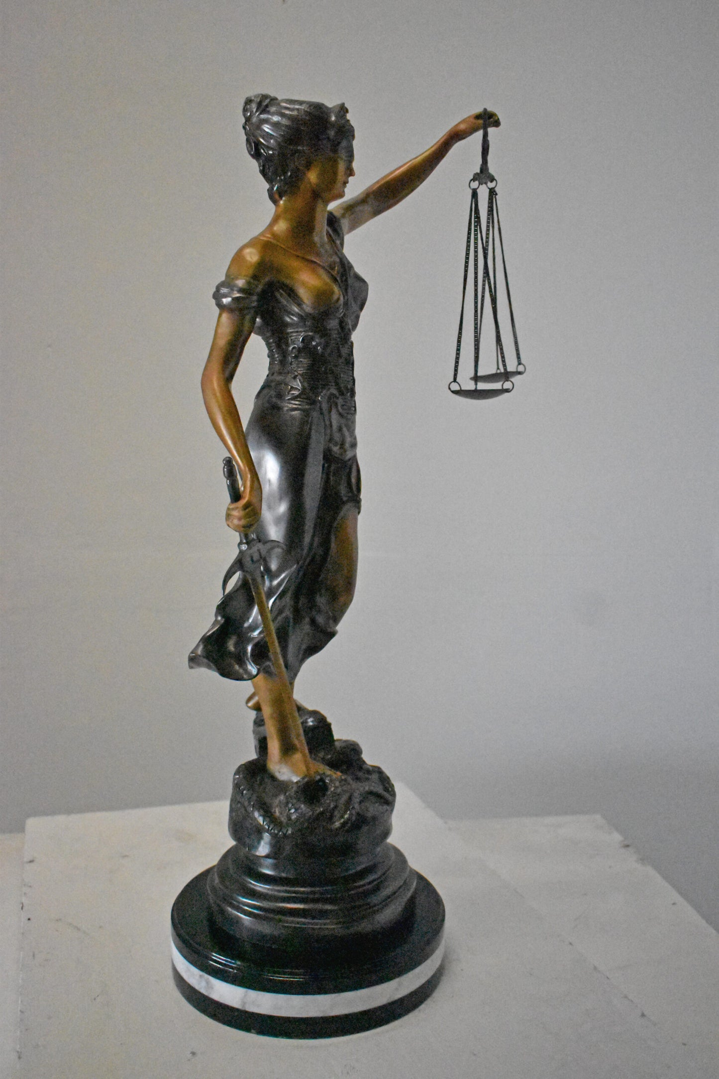Lady Justice bronze statue mounted on a marble - Size: 14"L x 16"W x 32"H.