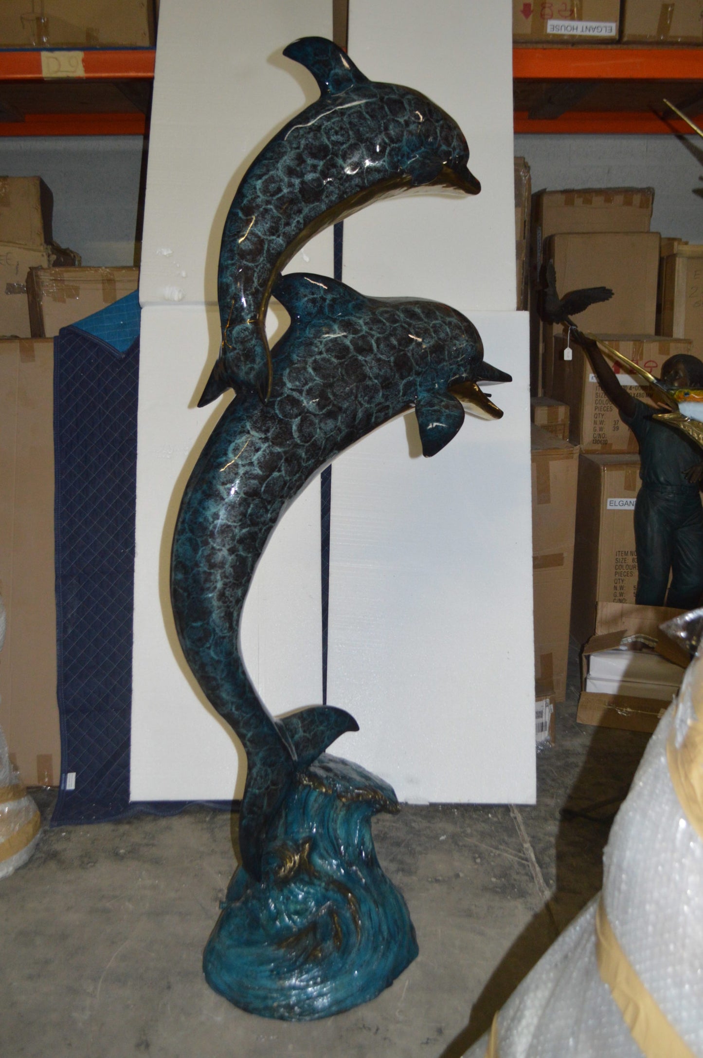 Two Dolphins Overreach Others on Waves Bronze Statue -  44"L x 23"W x 76"H. 