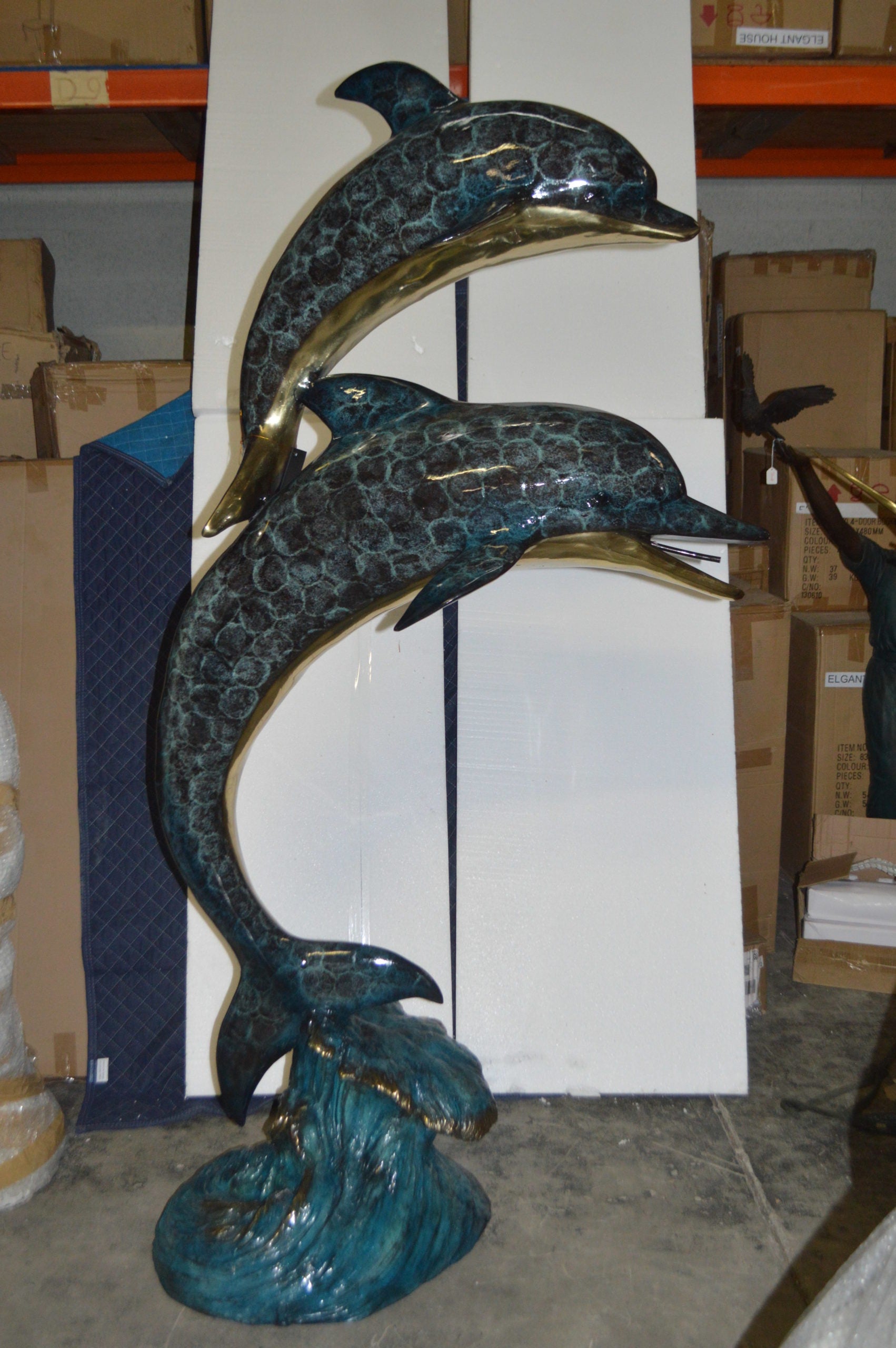 Two Dolphins Overreach Others on Waves Bronze Statue -  44"L x 23"W x 76"H. 