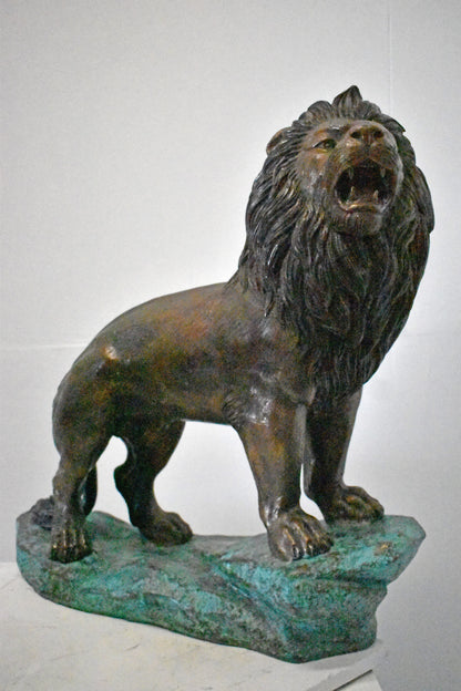 Pair of Standing Lions Bronze Statues - Size: 26"L x 11"W x 25"H.