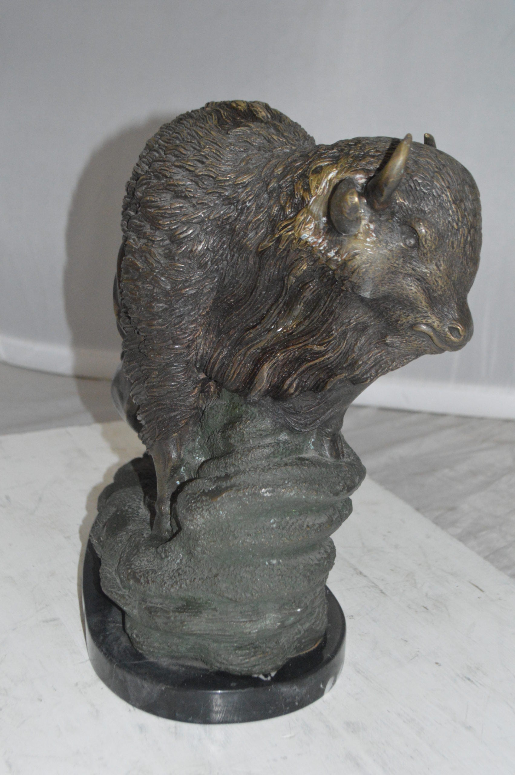 Bison Bronze Statue -  Size: 7"L x 14"W x 15"H. 