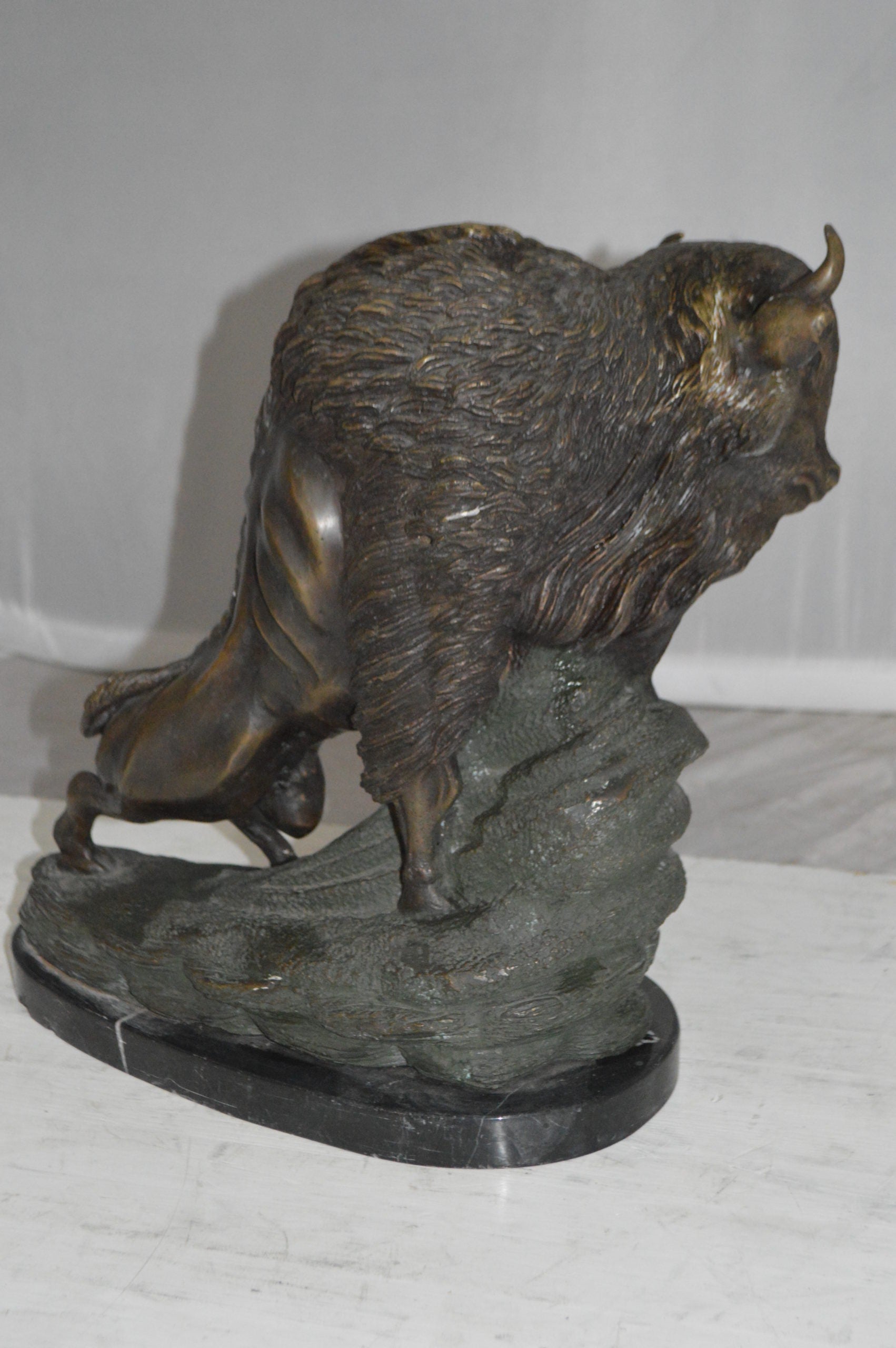 Bison Bronze Statue -  Size: 7"L x 14"W x 15"H. 