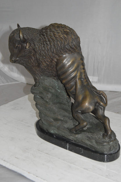 Bison Bronze Statue -  Size: 7"L x 14"W x 15"H. 