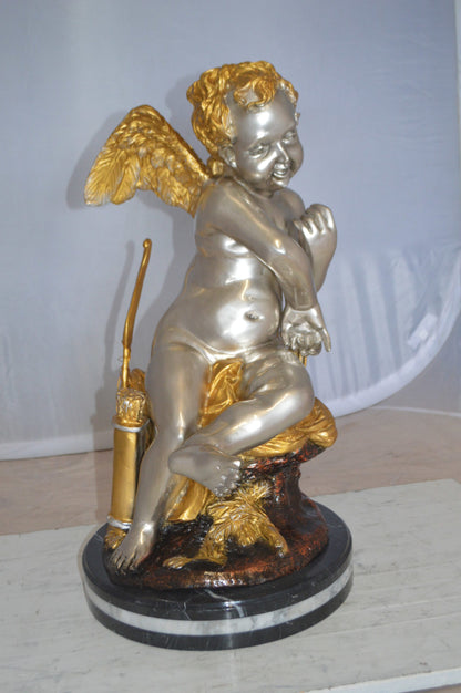 Cupid Girl On A Rock Bronze Statue  -  Size: 20"L x 15"W x 25"H. 