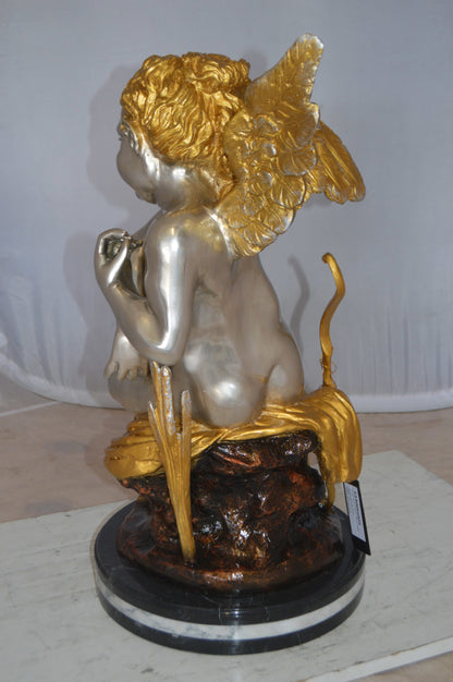 Cupid Girl On A Rock Bronze Statue  -  Size: 20"L x 15"W x 25"H. 