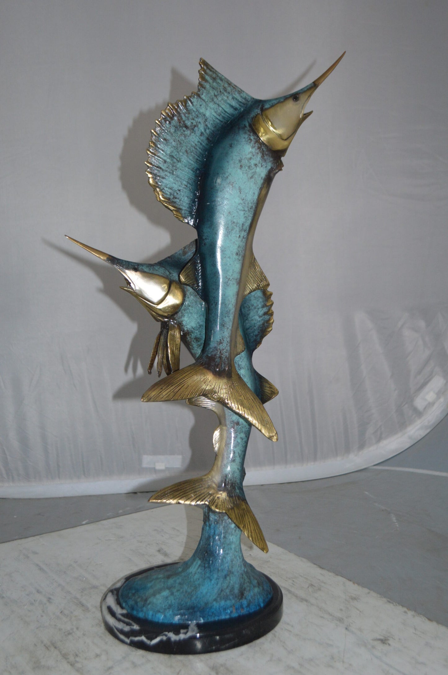 Two Sailfish jumping of water bronze statue -  Size: 13"L x 6"W x 28"H.