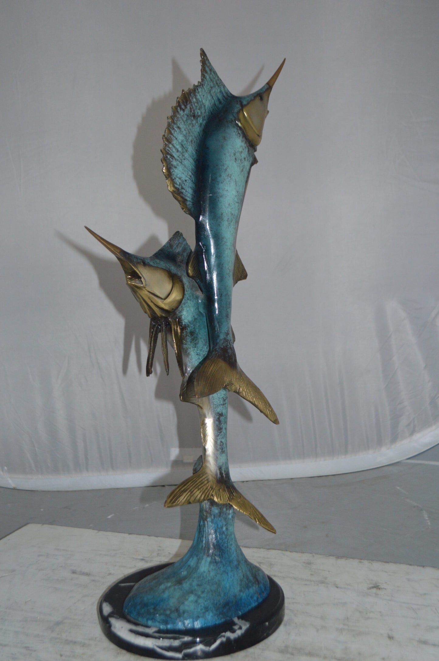 Two Sailfish jumping of water bronze statue -  Size: 13"L x 6"W x 28"H.