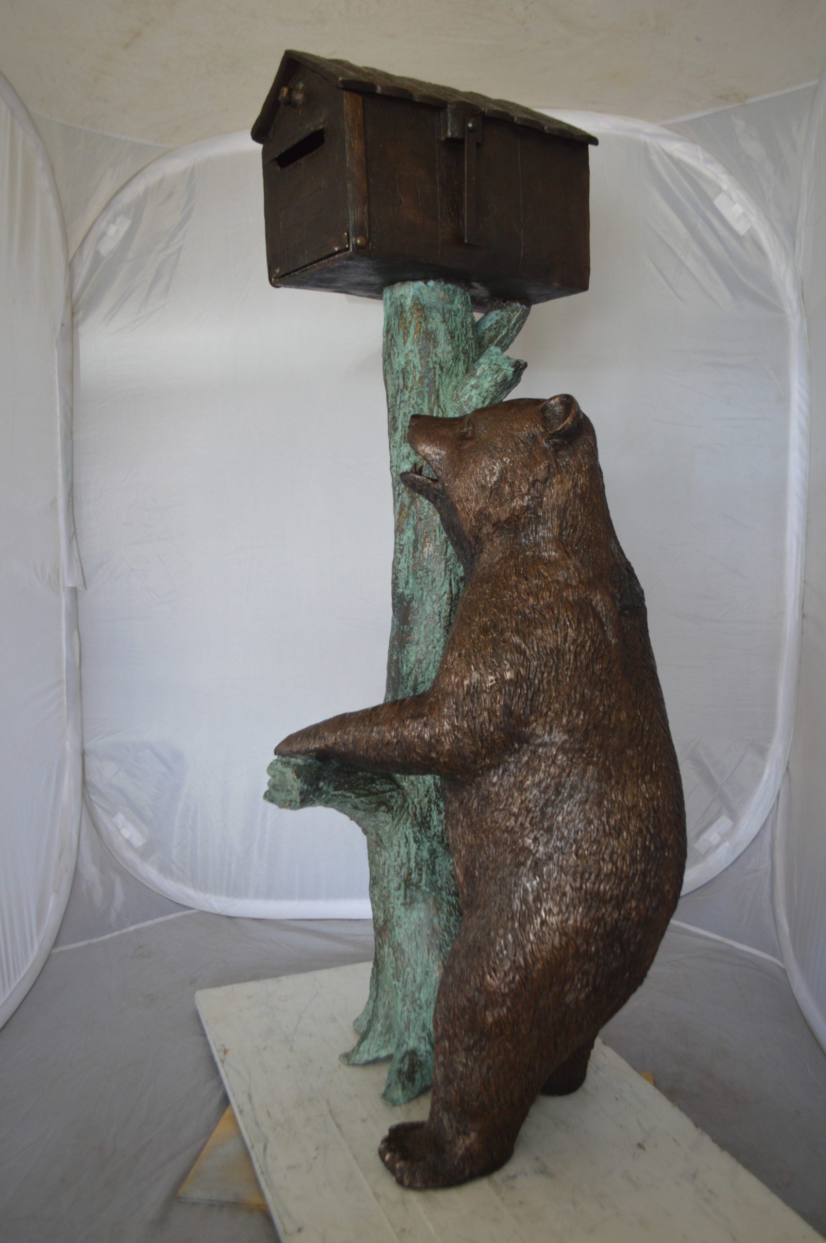 Bear beside a Tree with Mailbox Bronze Statue -  Size: 19"L x 20"W x 50"H. 