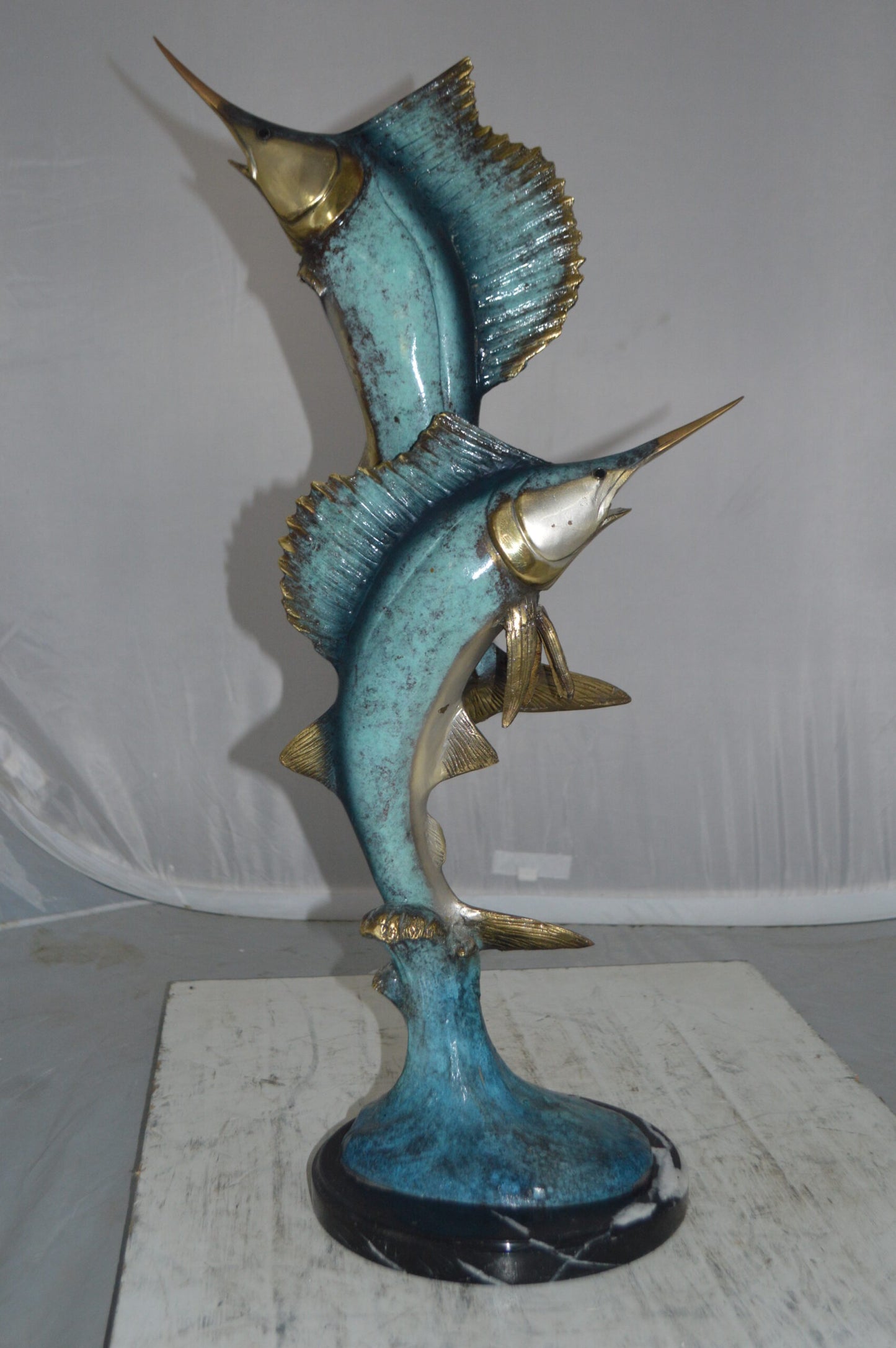 Two Sailfish jumping of water bronze statue -  Size: 13"L x 6"W x 28"H.