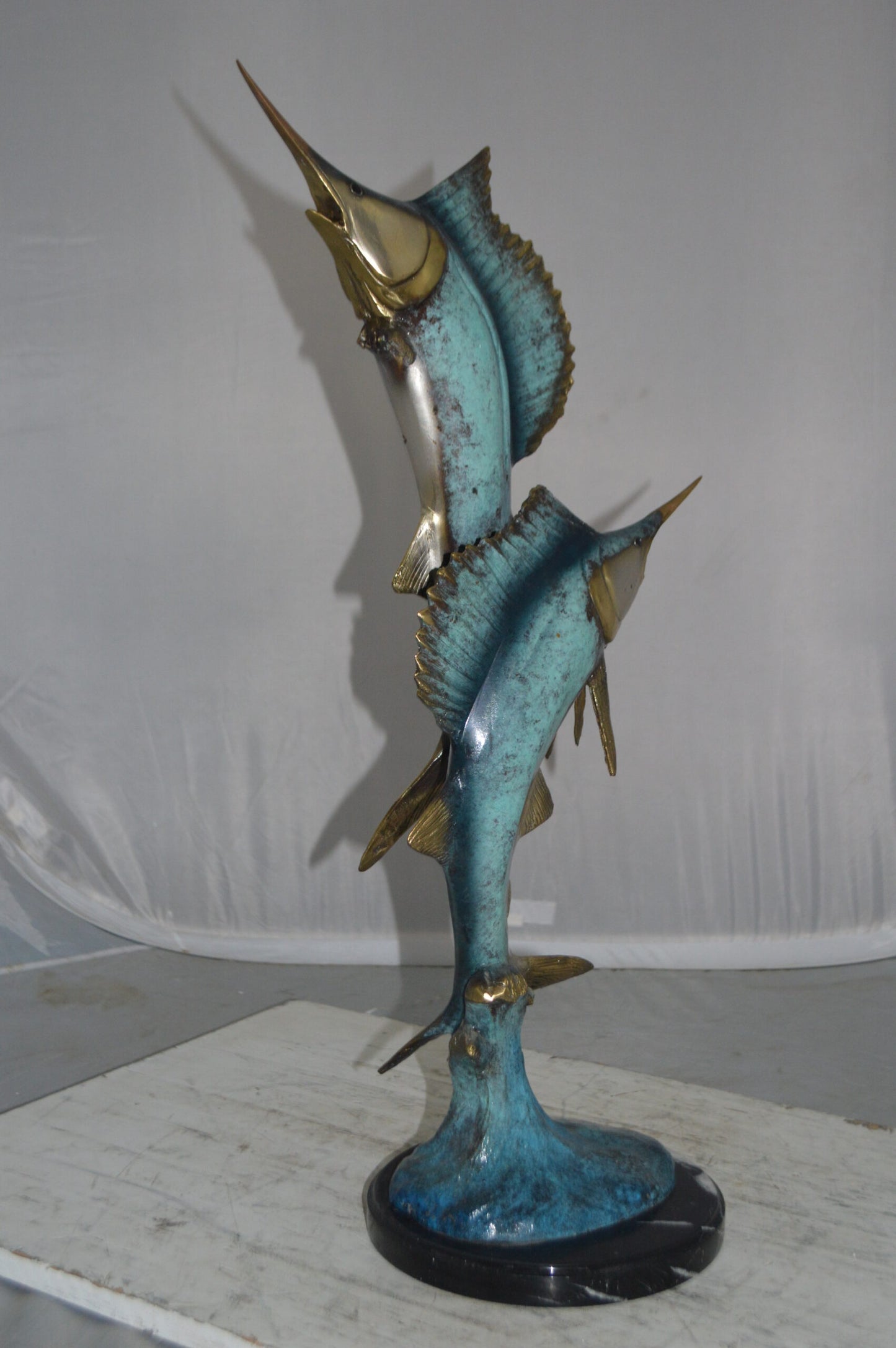 Two Sailfish jumping of water bronze statue -  Size: 13"L x 6"W x 28"H.