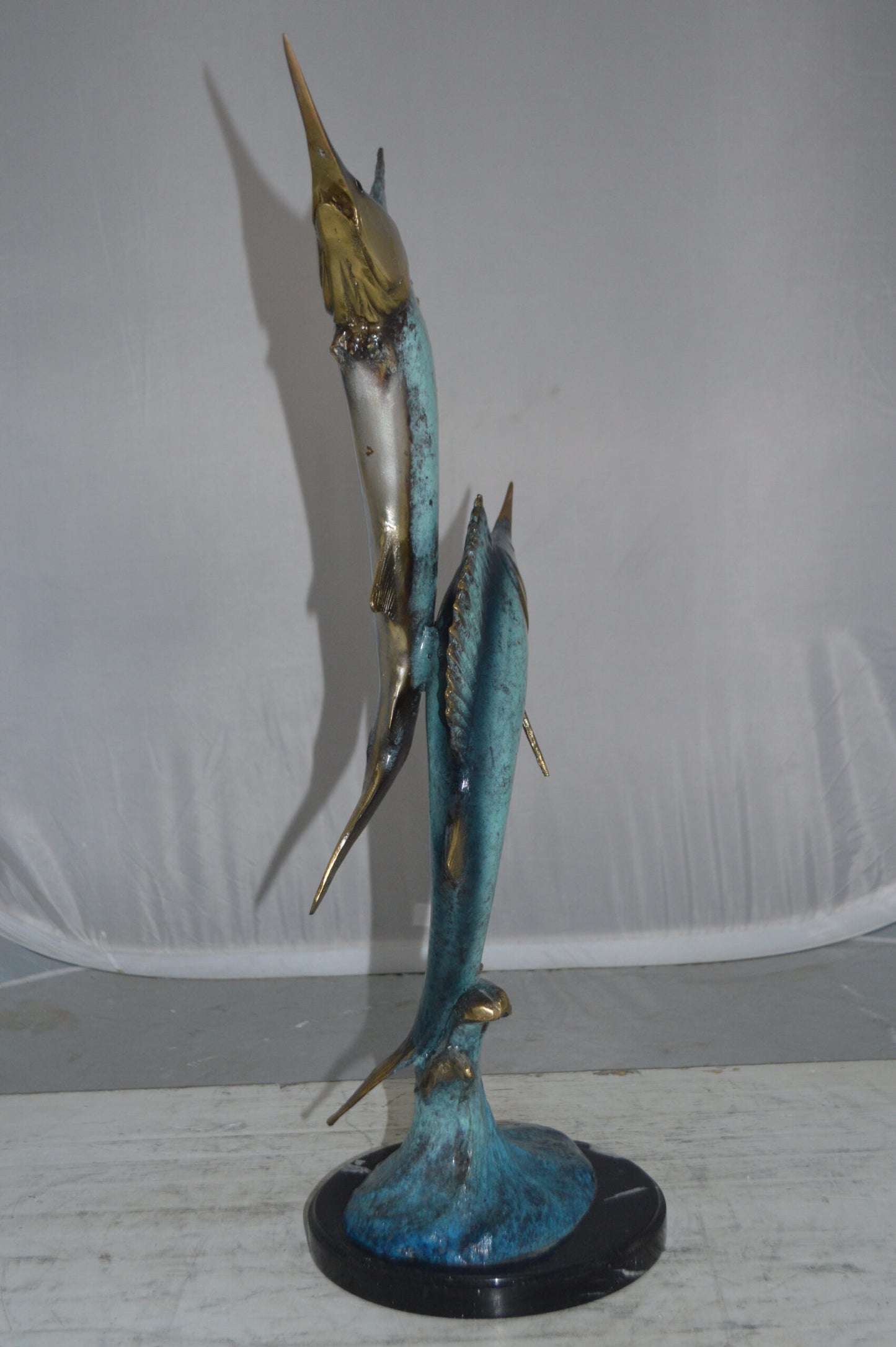 Two Sailfish jumping of water bronze statue -  Size: 13"L x 6"W x 28"H.