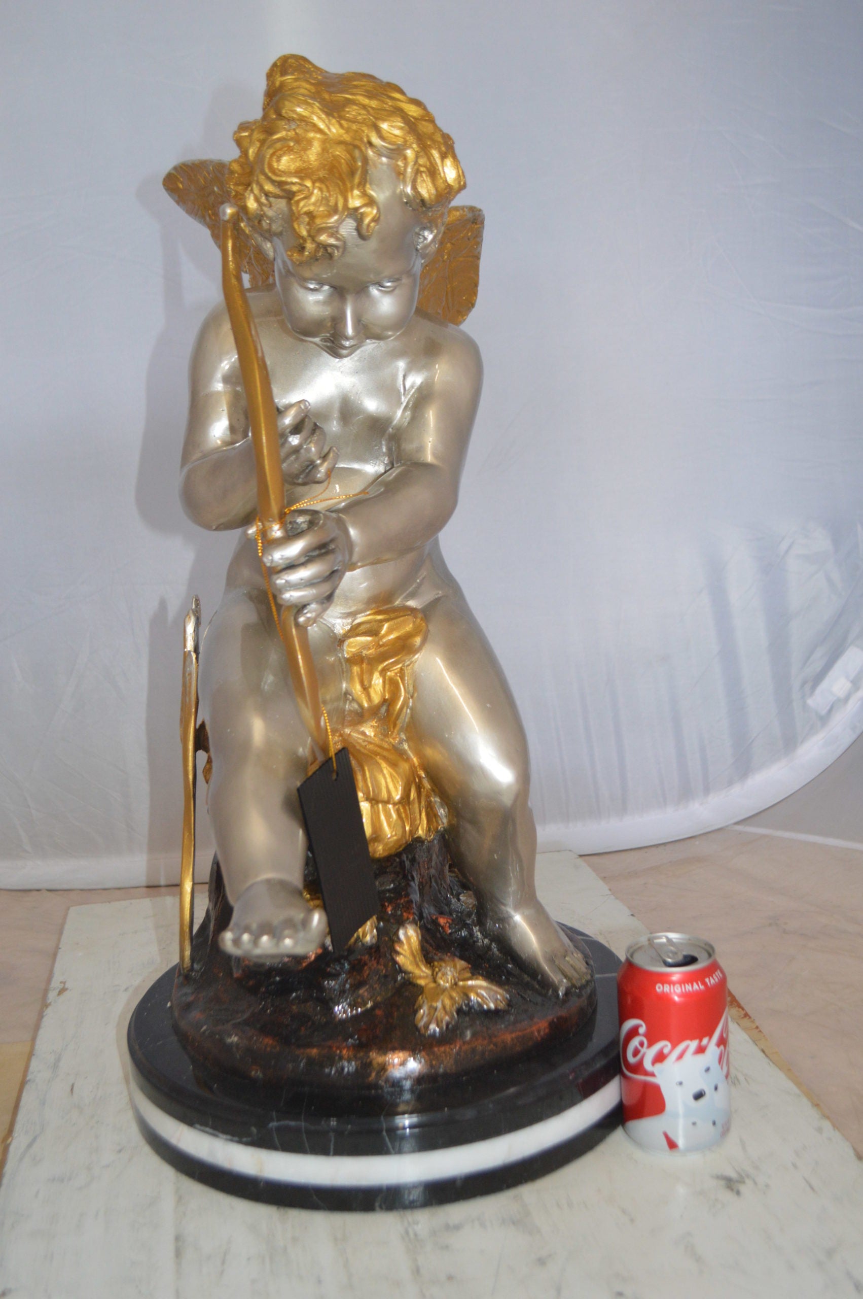 Cupid Boy On A Rock Bronze Statue  -  Size: 20"L x 15"W x 26"H. 