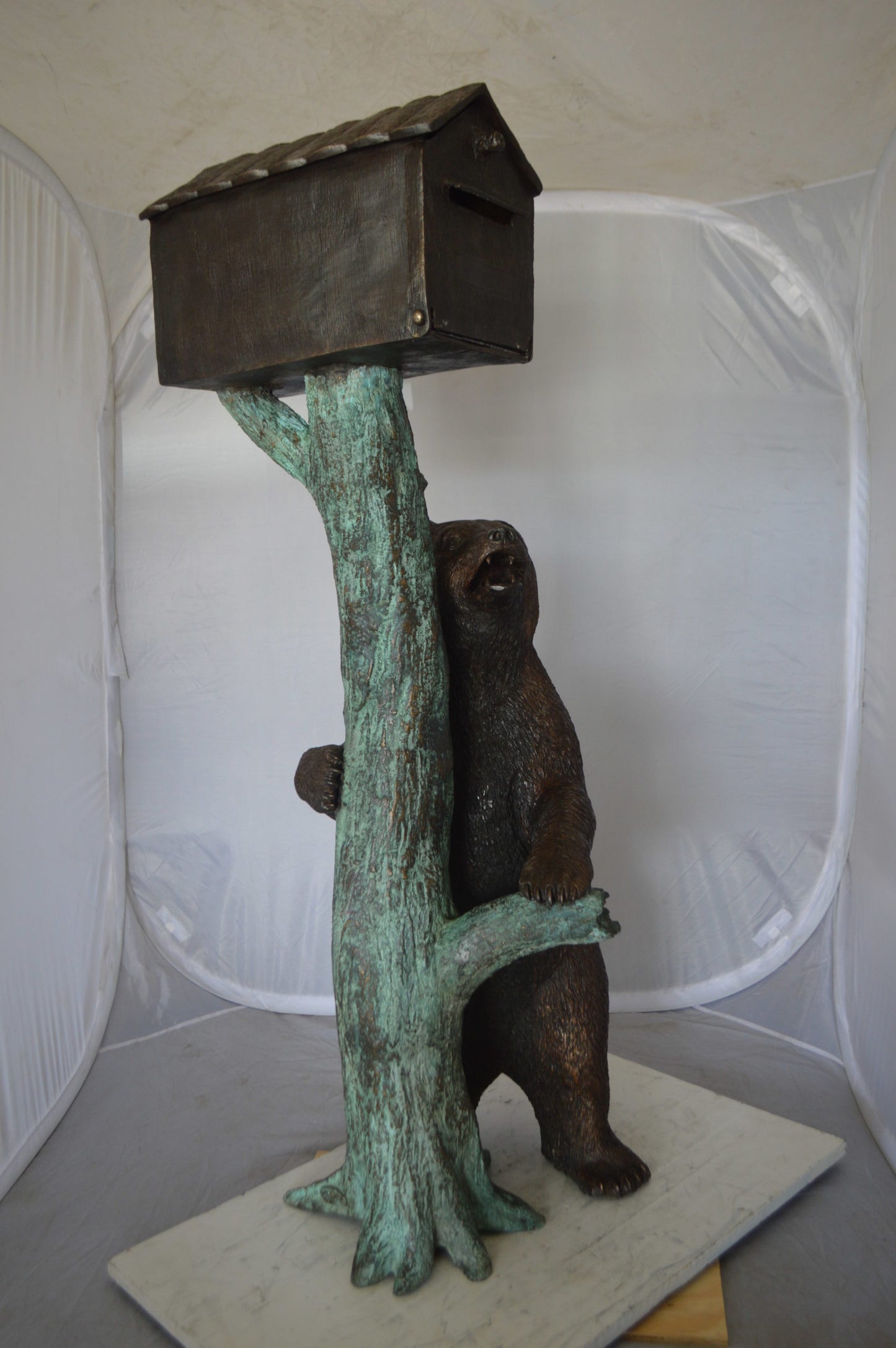 Bear beside a Tree with Mailbox Bronze Statue -  Size: 19"L x 20"W x 50"H. 