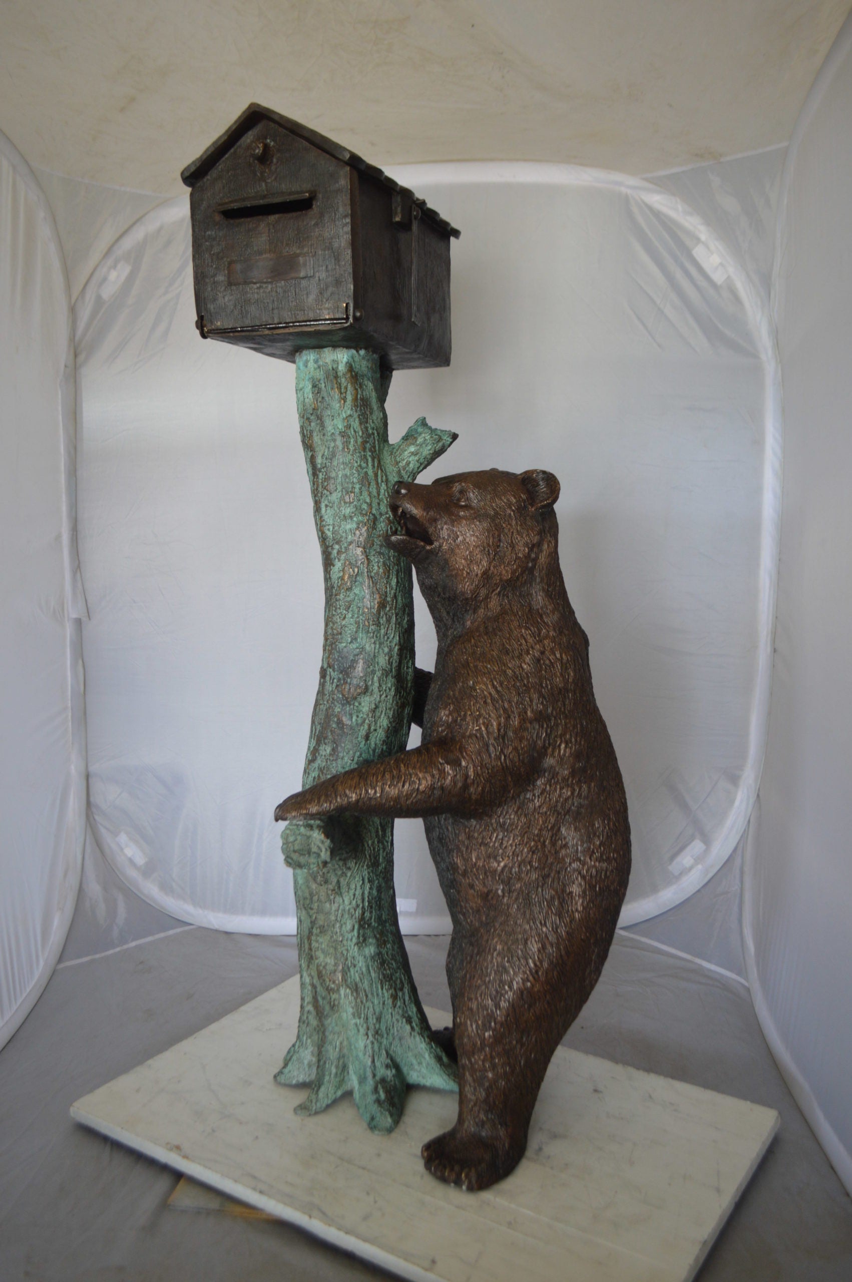 Bear beside a Tree with Mailbox Bronze Statue -  Size: 19"L x 20"W x 50"H. 