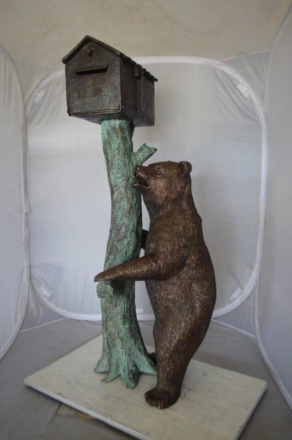 Bear beside a Tree with Mailbox Bronze Statue -  Size: 19"L x 20"W x 50"H. 