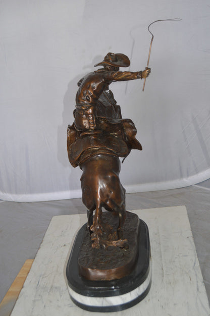 Bronco Buster by Remington Bronze Statue on a triple marble -  21"x 10"x 26"H. 