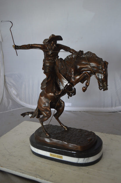 Bronco Buster by Remington Bronze Statue on a triple marble -  21"x 10"x 26"H. 