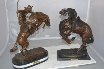 Bronco Buster by Remington Bronze Statue on a triple marble -  21"x 10"x 26"H. 