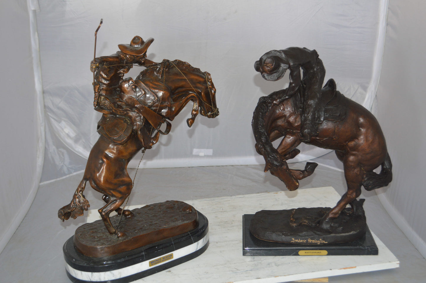 Bronco Buster by Remington Bronze Statue on a triple marble -  21"x 10"x 26"H. 