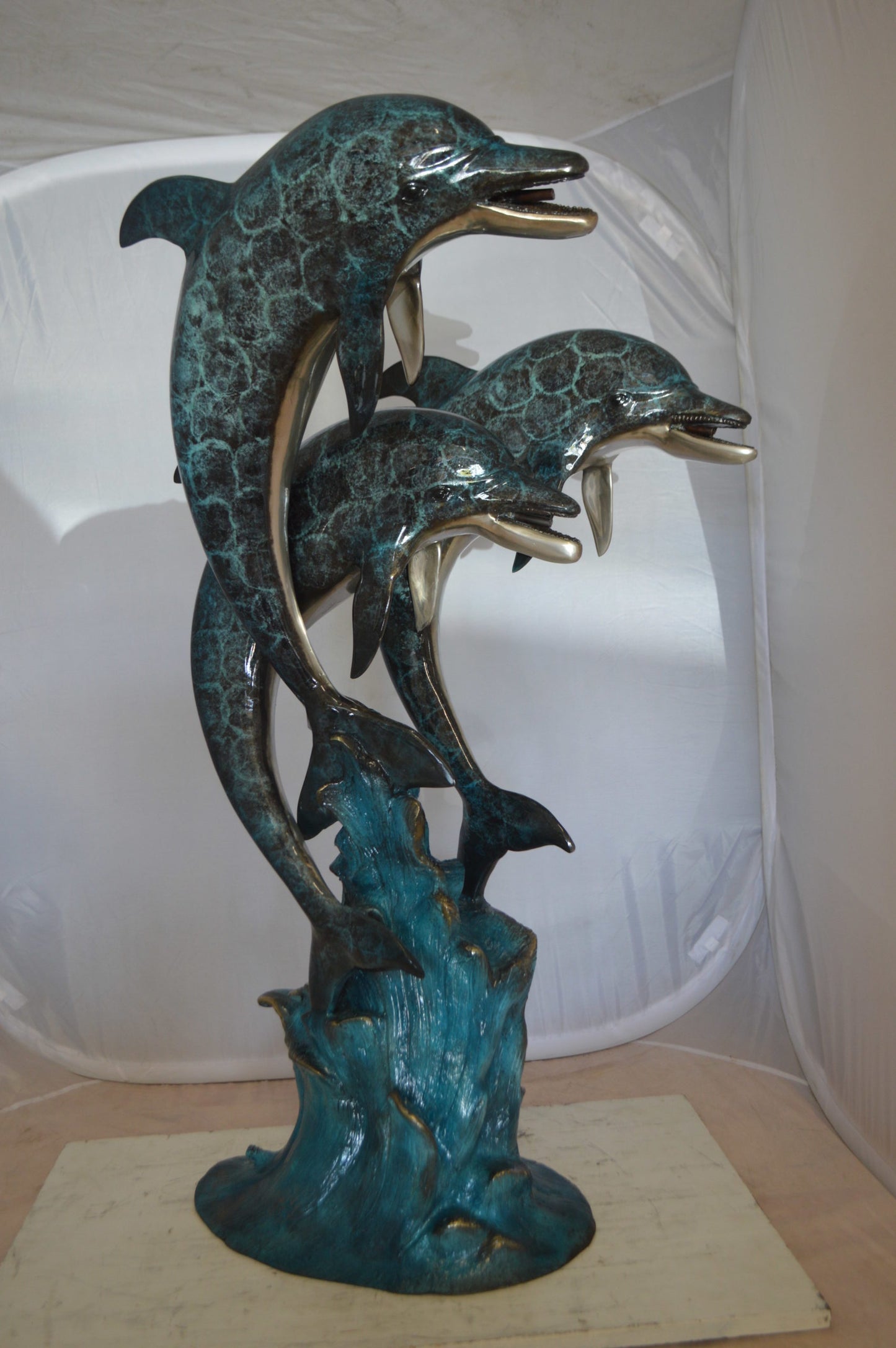 Three Dolphin Fountain  Bronze Statue -  Size: 21"L x 26"W x 45"H. 