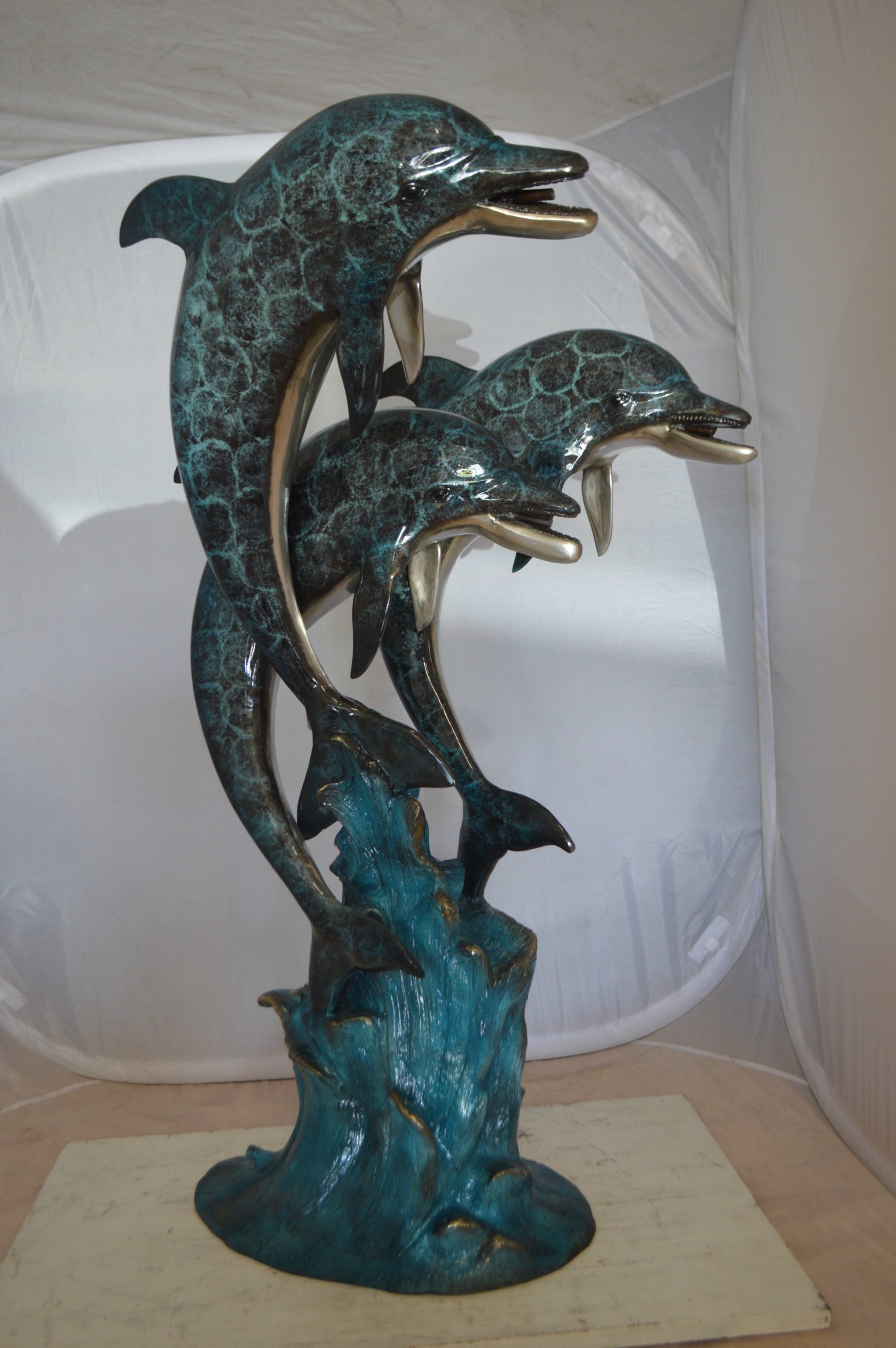 Three Dolphin Fountain  Bronze Statue -  Size: 21"L x 26"W x 45"H. 