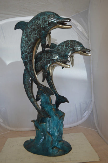 Three Dolphin Fountain  Bronze Statue -  Size: 21"L x 26"W x 45"H. 