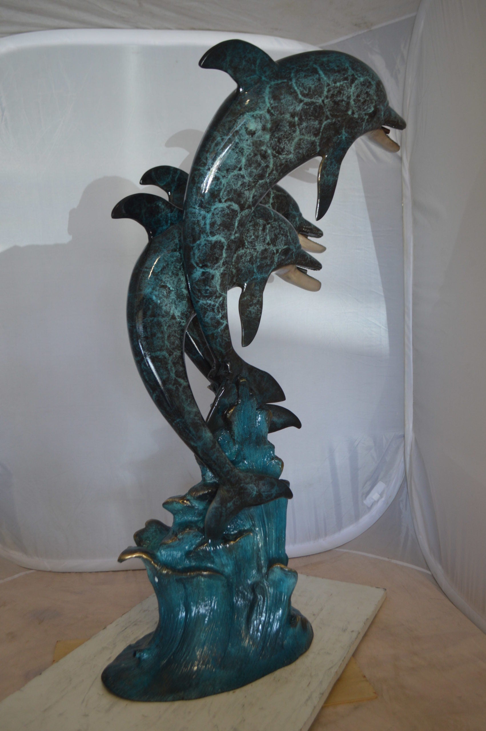 Three Dolphin Fountain  Bronze Statue -  Size: 21"L x 26"W x 45"H. 