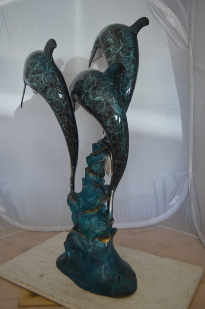 Three Dolphin Fountain  Bronze Statue -  Size: 21"L x 26"W x 45"H. 