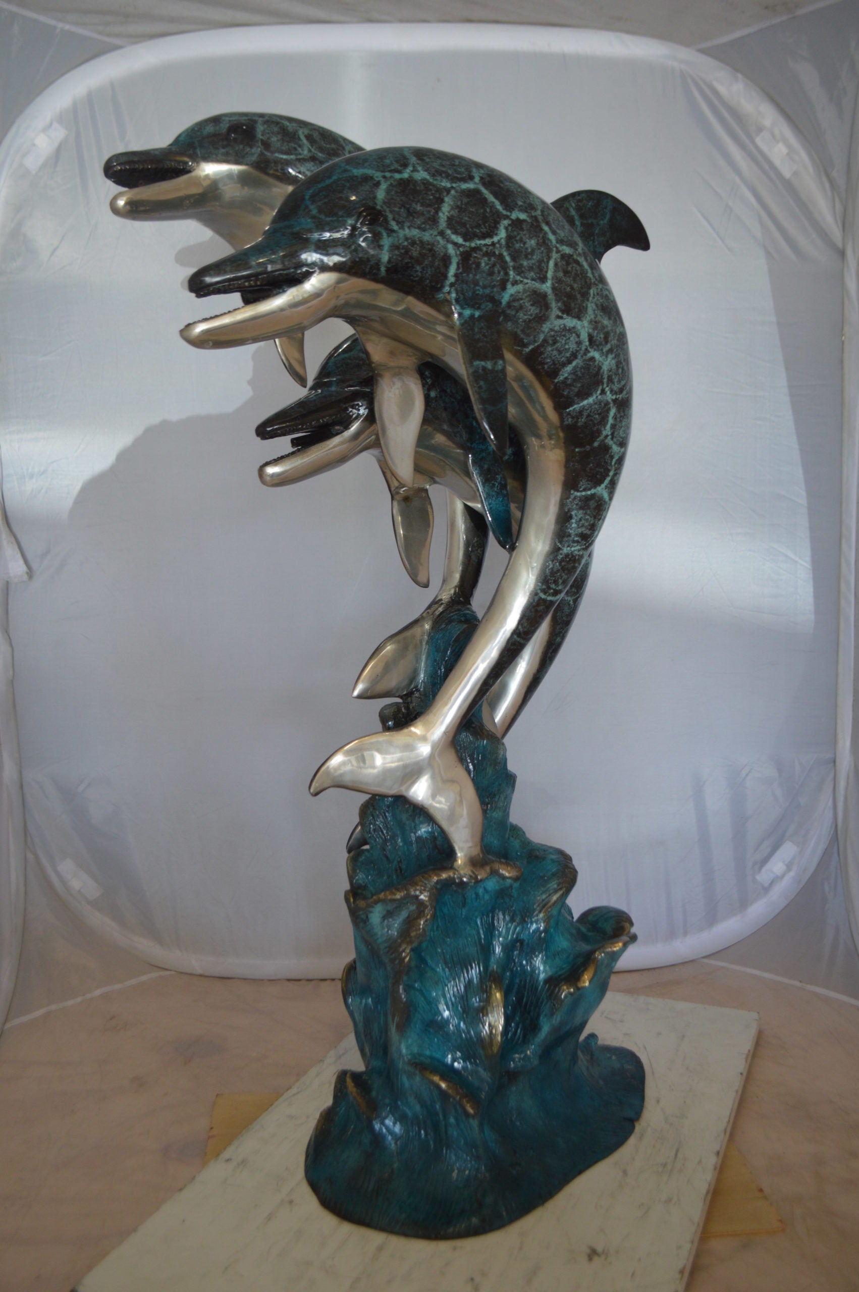 Three Dolphin Fountain  Bronze Statue -  Size: 21"L x 26"W x 45"H. 