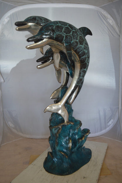Three Dolphin Fountain  Bronze Statue -  Size: 21"L x 26"W x 45"H. 