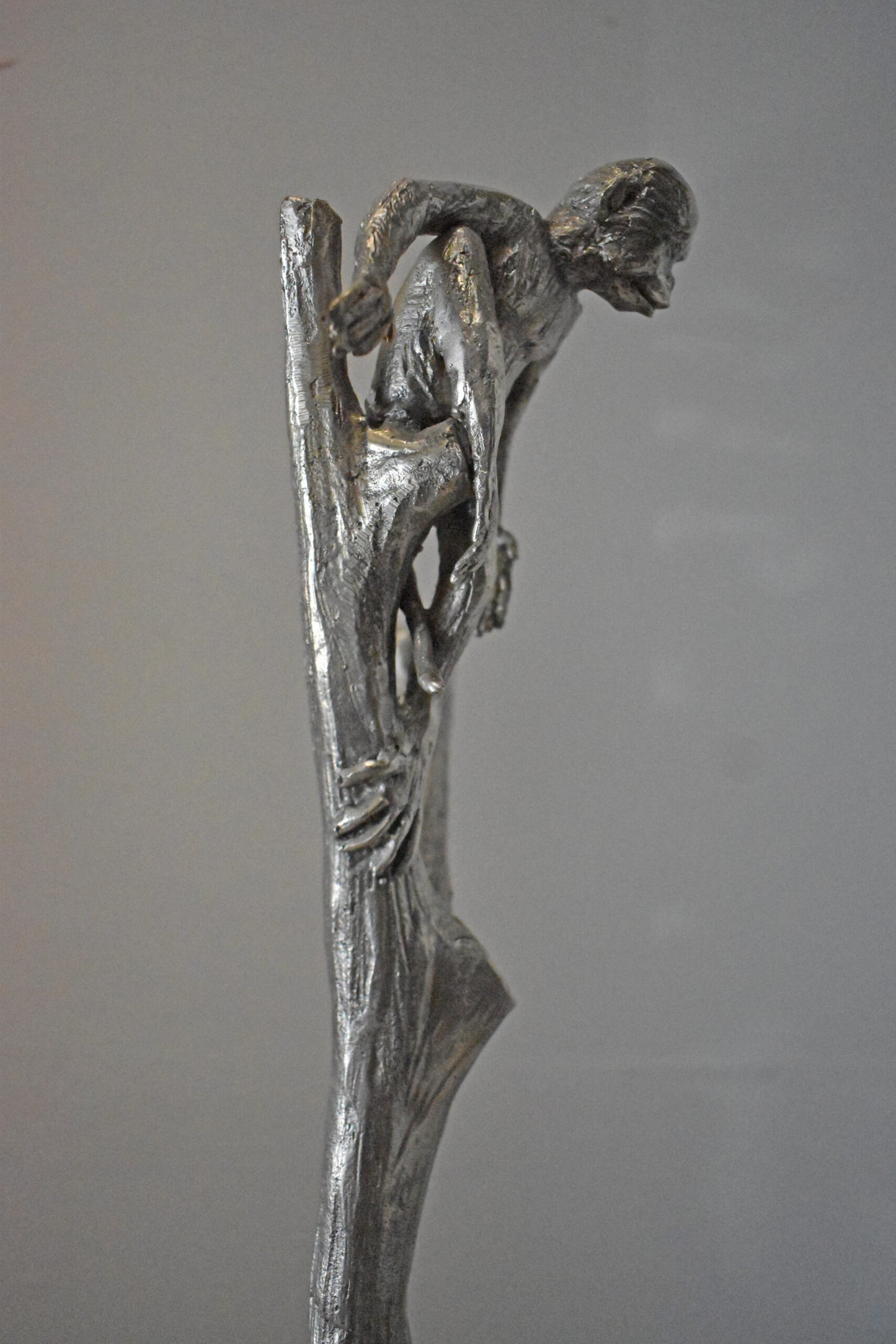 Monkey Resting on a Tree Silver Finish Bronze Statue - Size: 12" x 13" x 27"H.