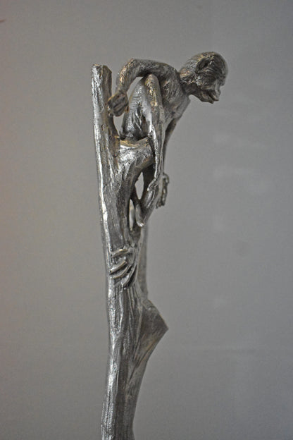 Monkey Resting on a Tree Silver Finish Bronze Statue - Size: 12" x 13" x 27"H.