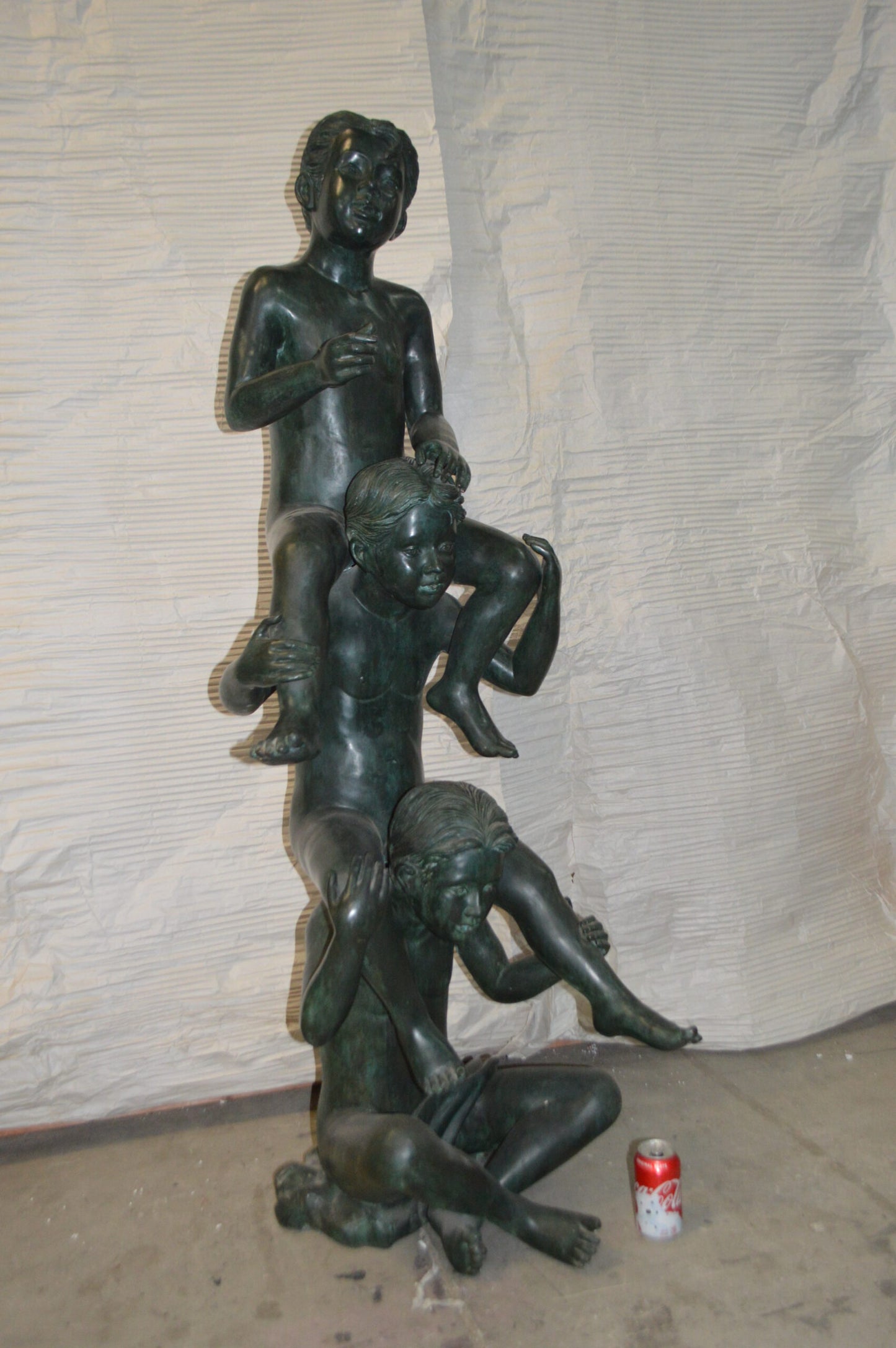 Three kids on Each other fountain Bronze Statue -  Size: 20"L x 27"W x 64"H.