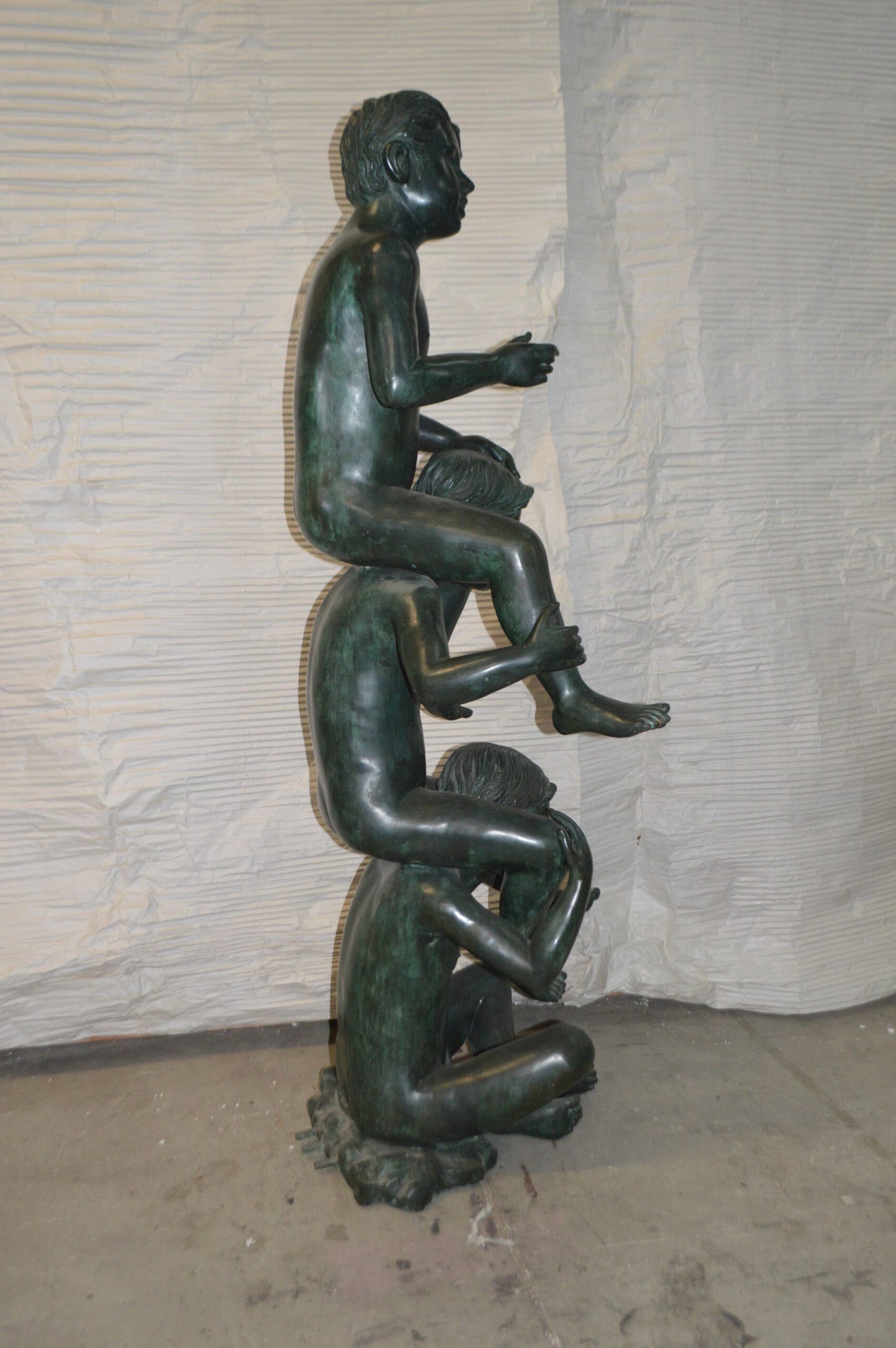 Three kids on Each other fountain Bronze Statue -  Size: 20"L x 27"W x 64"H.