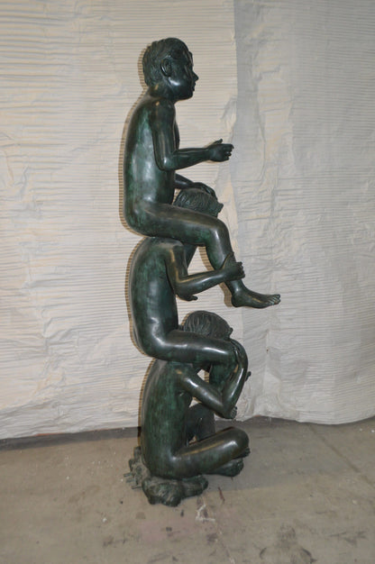 Three kids on Each other fountain Bronze Statue -  Size: 20"L x 27"W x 64"H.