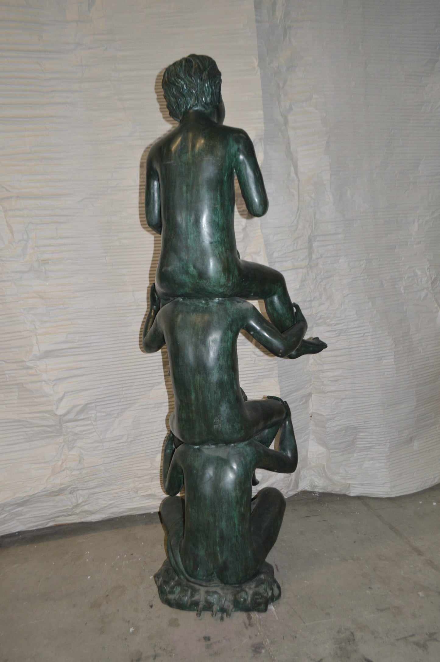 Three kids on Each other fountain Bronze Statue -  Size: 20"L x 27"W x 64"H.