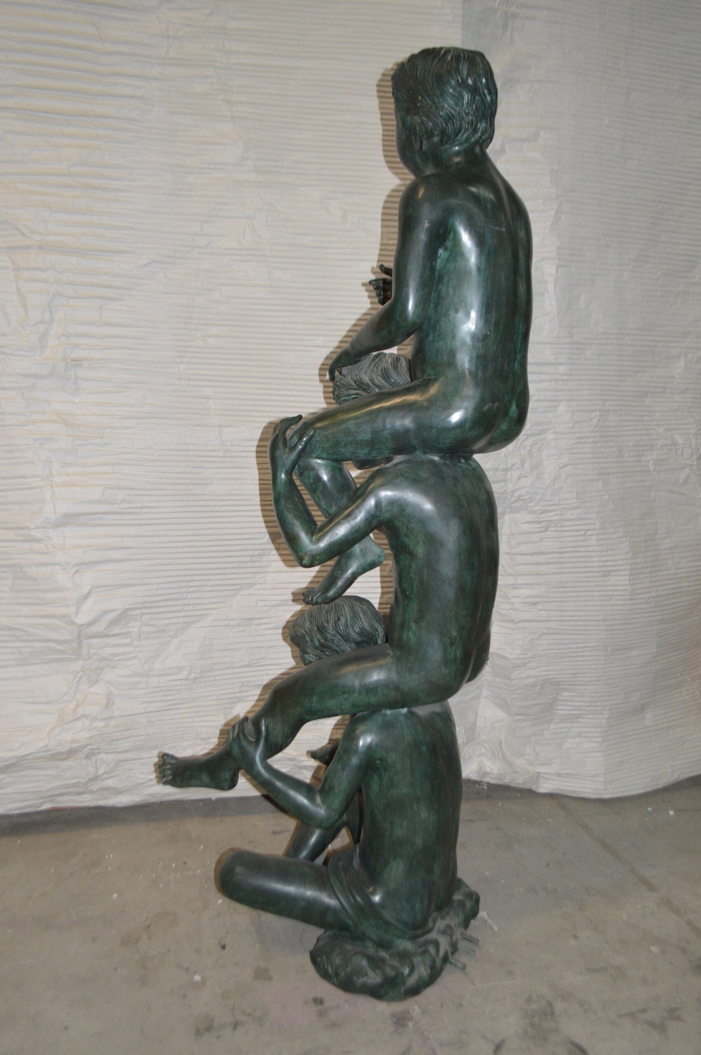 Three kids on Each other fountain Bronze Statue -  Size: 20"L x 27"W x 64"H.