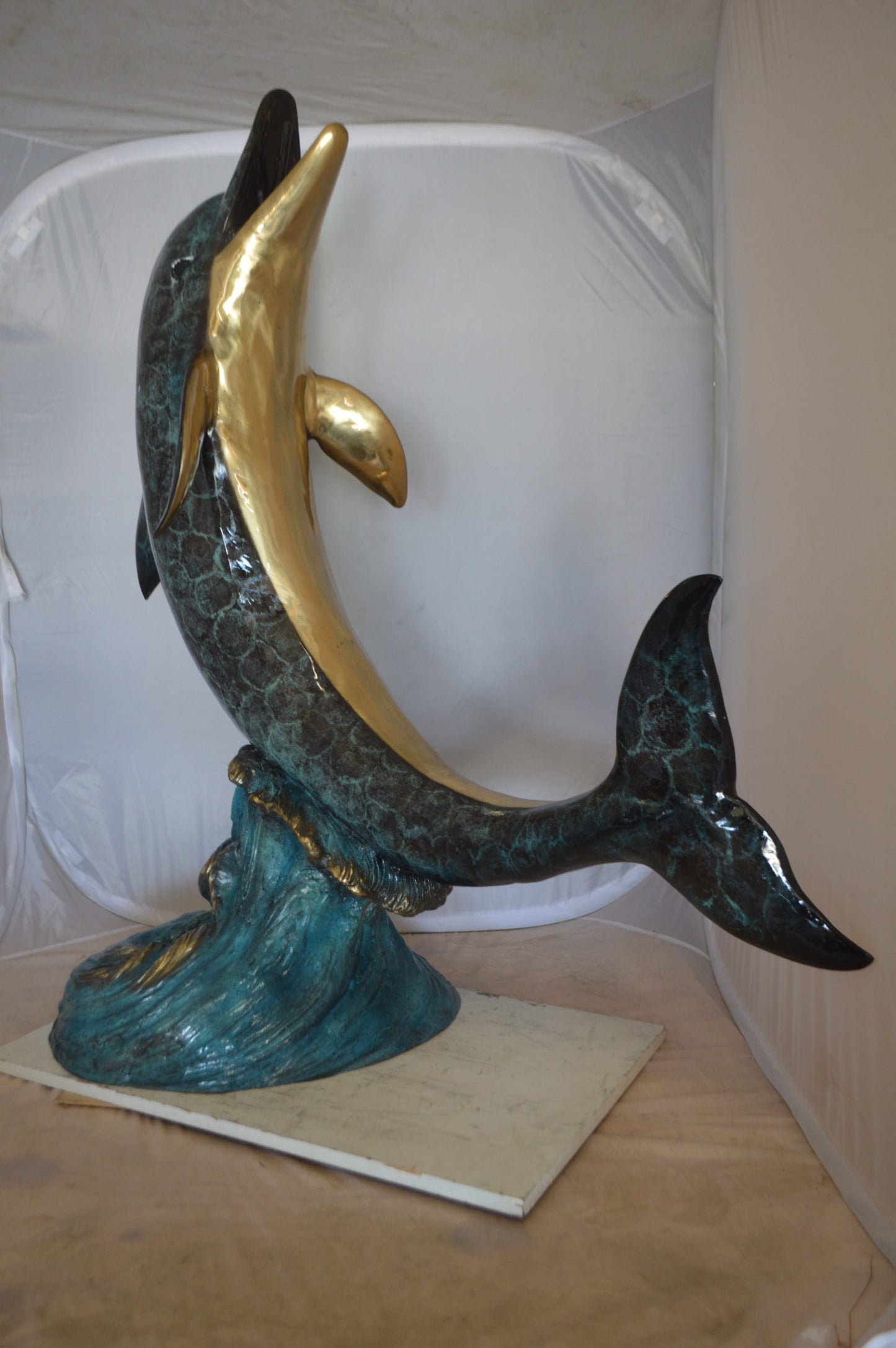 Single Dolphin  On Wave Fountain Bronze Statue -  Size: 48"L x 24"W x 53"H. 