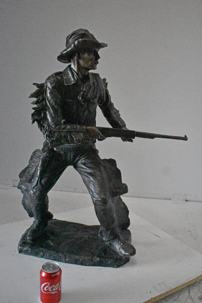 Cowboy with His Gun Bronze Statue - Size: 26"L x 13"W x 33"H.