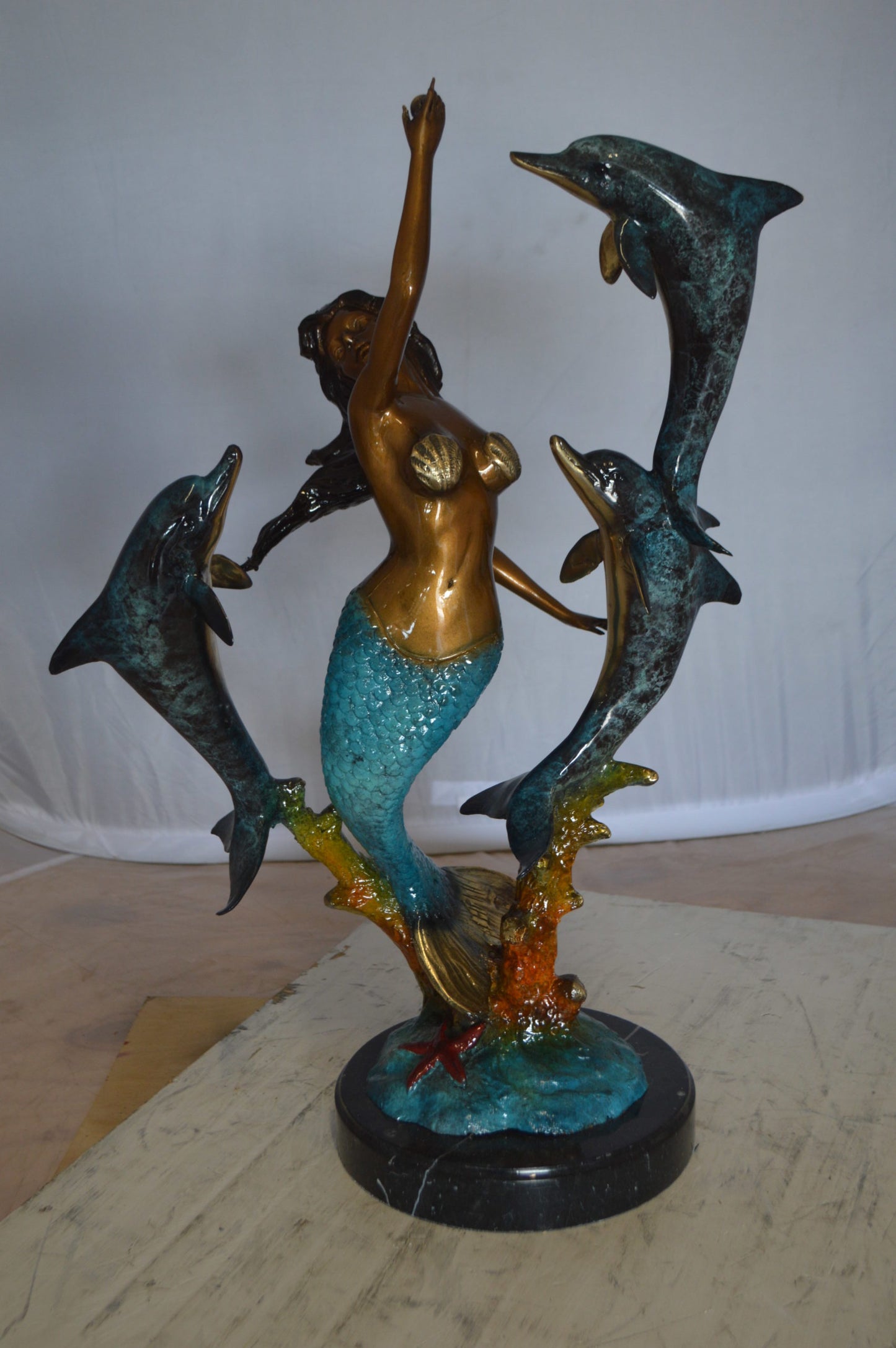 Mermaid With Three Dolphins Bronze Statue -  Size: 15"L x 8"W x 25"H. 