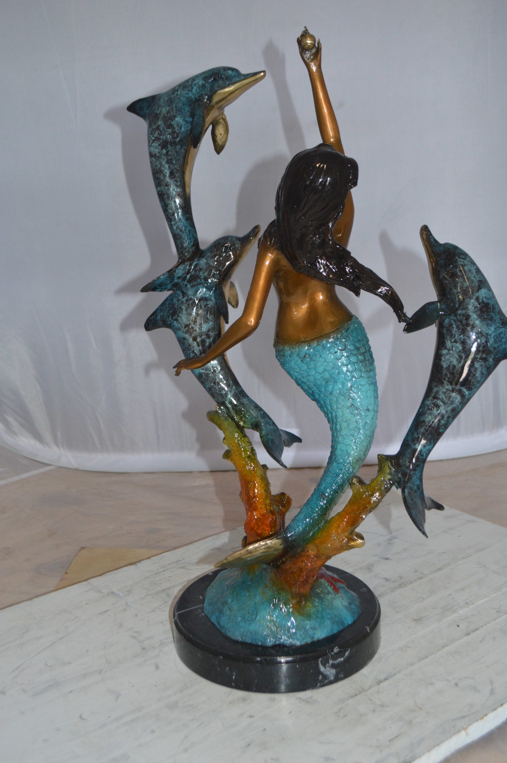 Mermaid With Three Dolphins Bronze Statue -  Size: 15"L x 8"W x 25"H. 