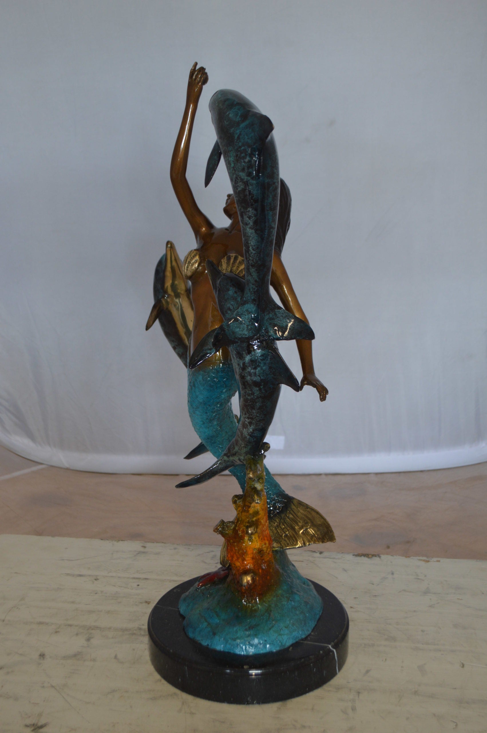 Mermaid With Three Dolphins Bronze Statue -  Size: 15"L x 8"W x 25"H. 