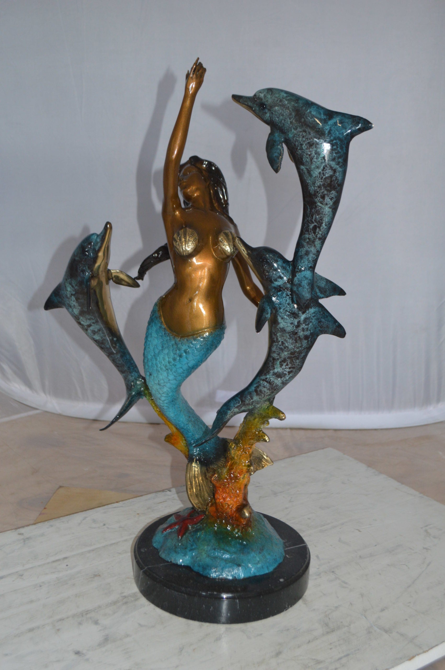 Mermaid With Three Dolphins Bronze Statue -  Size: 15"L x 8"W x 25"H. 
