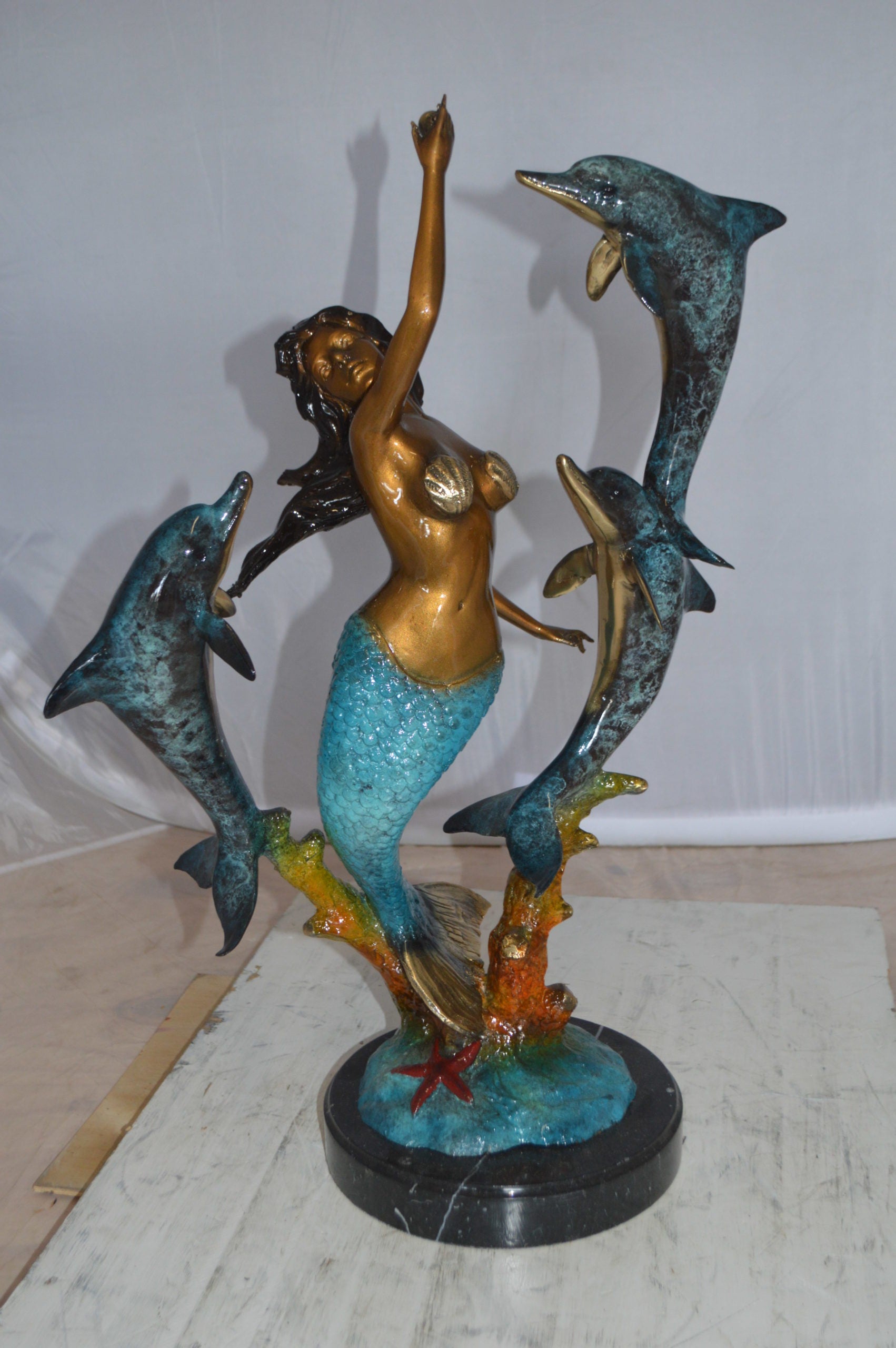 Mermaid With Three Dolphins Bronze Statue -  Size: 15"L x 8"W x 25"H. 