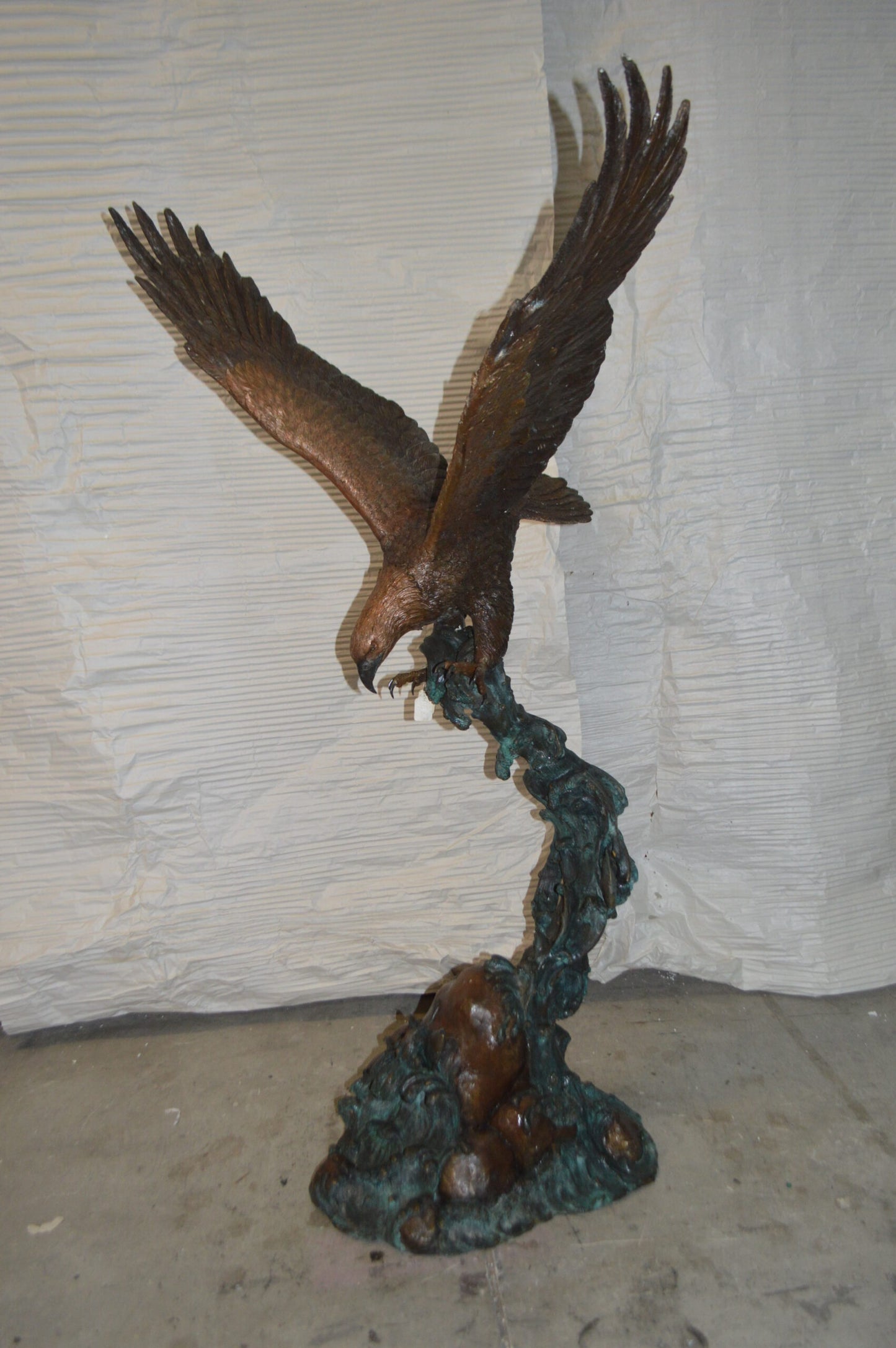 Flying Eagle on Wave Bronze Statue -  Size: 25"L x 35"W x 57"H.