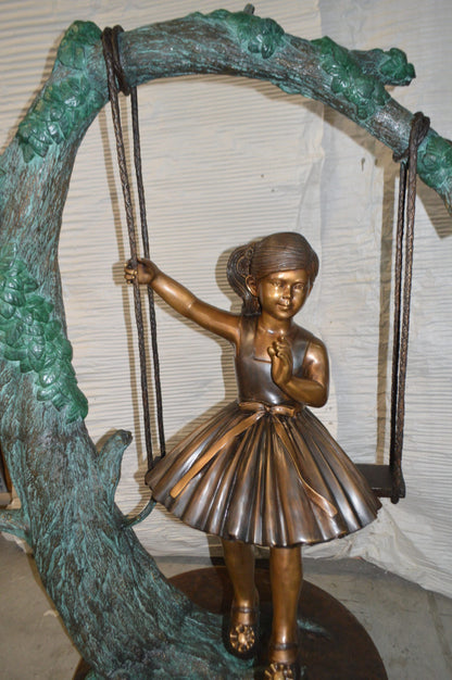 Girl on Swing 65 Bronze Statue -  Size: 44"L x 35"W x 65"H.