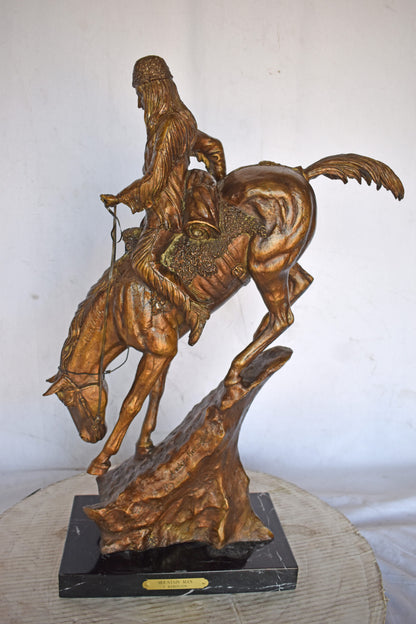 Mountain Man Bronze Statue, a Remington Replica - Size: 18"L x 8"W x 28"H.