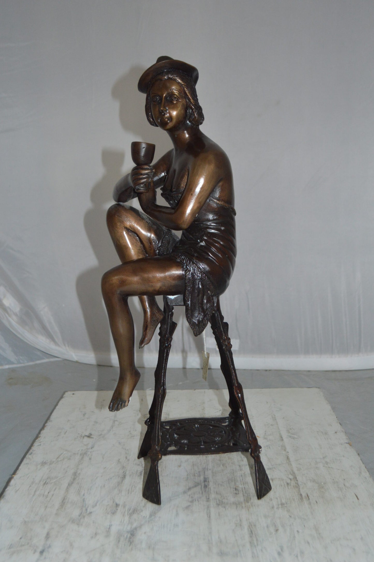 Lady W Champagne Glass Bronze Statue - Size: 8"L x 6"W x 22"H.